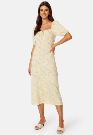 Se Happy Holly Toni dress Yellow / Floral 32/34 ved Bubbleroom