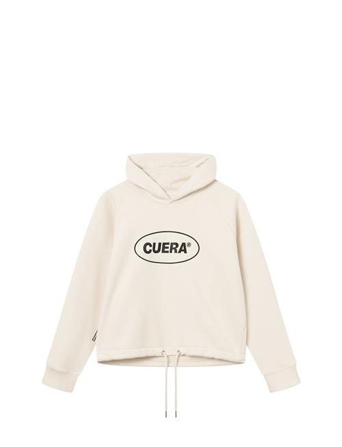 Se Cuera Cropped Merch Hoodie Cuera Cream ved Booztlet