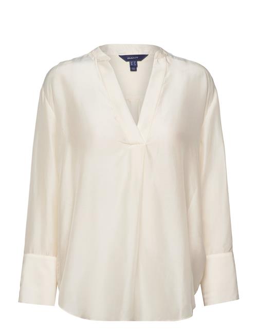 Se GANT Relaxed Stand Collar Blouse GANT Cream ved Booztlet