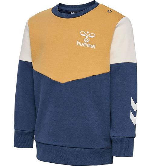 Se Hummel Hummel Sweatshirt - HmlHappy Now - Ochre/Sargasso Sea ved KidsWorld