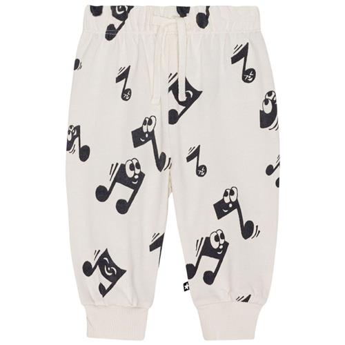 Se Molo GOTS Simeon Joggingbukser Happy Notes |  | 62 cm ved Babyshop