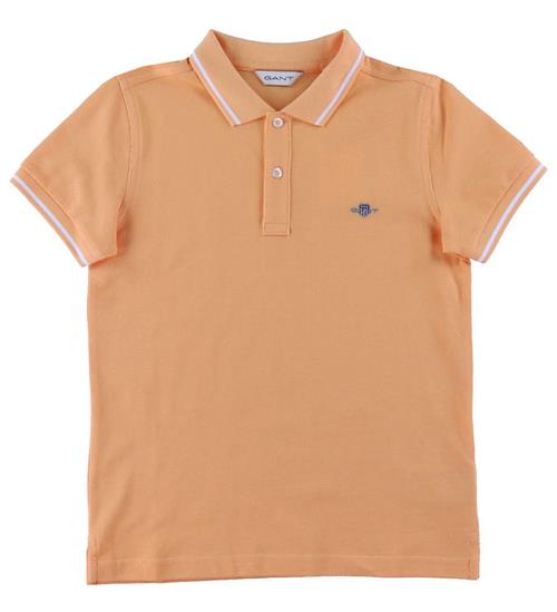 Se GANT GANT Polo - Shield - Coral Apricot ved KidsWorld