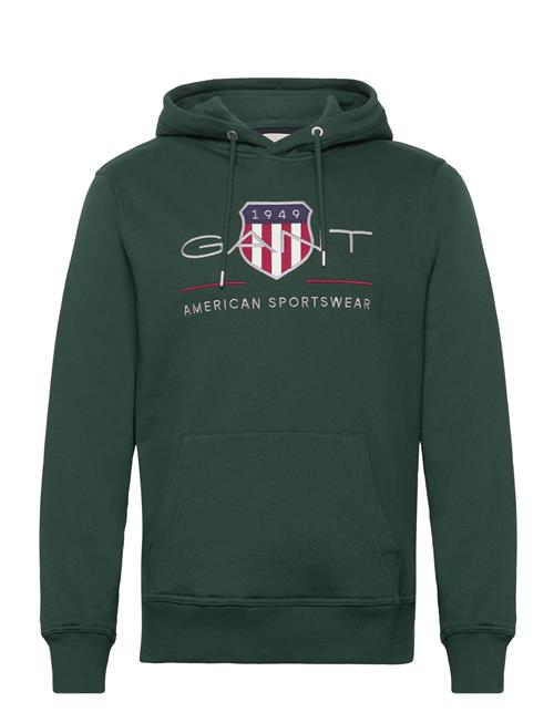 Se GANT Reg Archive Shield Hoodie GANT Green ved Booztlet