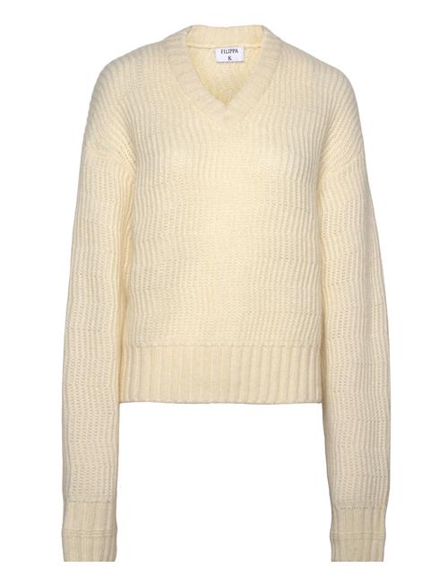 Se Filippa K Structure Sweater Filippa K Yellow ved Booztlet