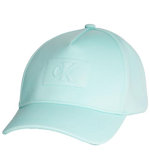 Se Calvin Klein Calvin Klein Kasket - Embossed Monogram - Blue Tint ved KidsWorld