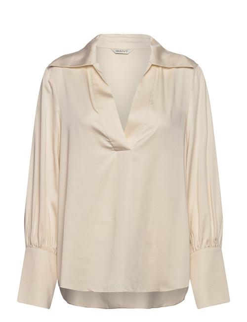 Se GANT Reg Pop Over High Cuff Blouse GANT Cream ved Booztlet