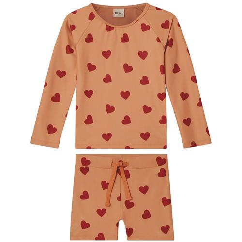 Se Kuling Rhodes Hjertemønstret UV-sæt Terracotta | Orange | 98/104 cm ved Babyshop