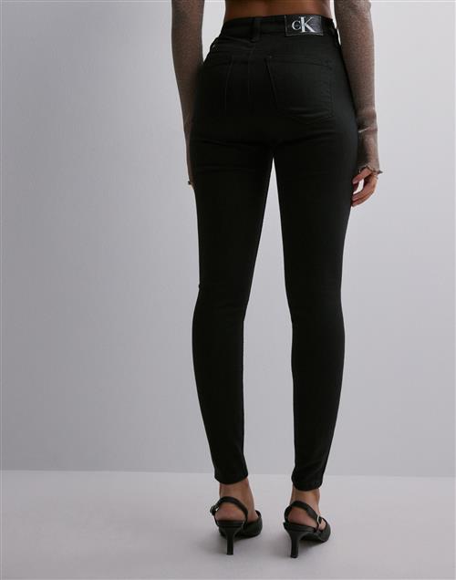 Se Calvin Klein Jeans - Sort - High Rise Super Skinny Ankle ved Nelly