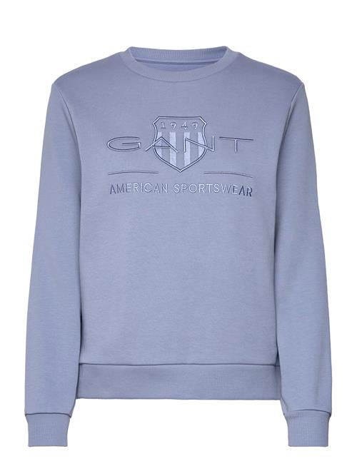 Se GANT Reg Tonal Shield C-Neck Sweat GANT Blue ved Booztlet