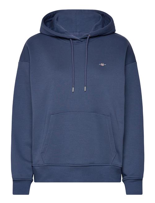 Se GANT Rel Shield Hoodie GANT Blue ved Booztlet