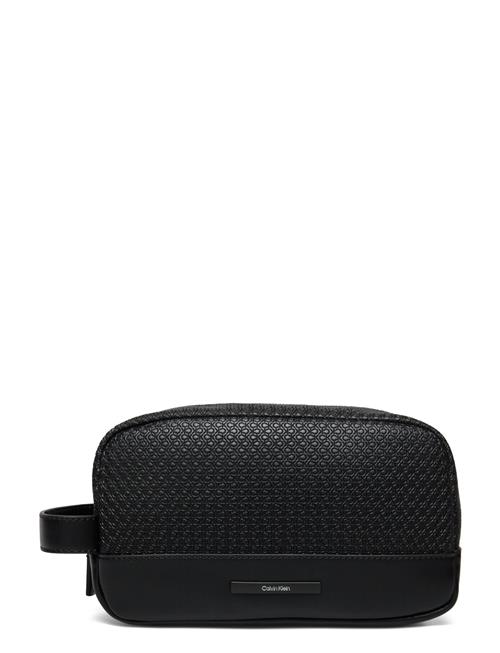 Se Calvin Klein Modern Bar Washbag Mono Calvin Klein Black ved Booztlet