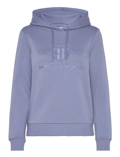 Se GANT Reg Tonal Shield Hoodie GANT Blue ved Booztlet