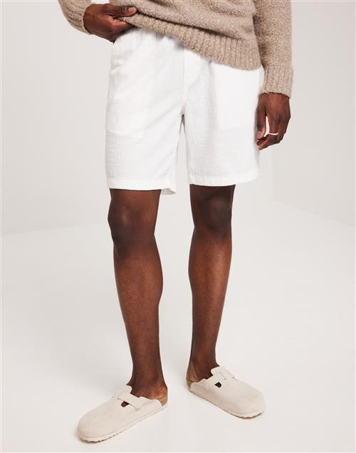 Se Jack & Jones Jpstjaiden Crinkle Jogger Short Sn Tynde shorts Cloud Dancer ved NLY Man