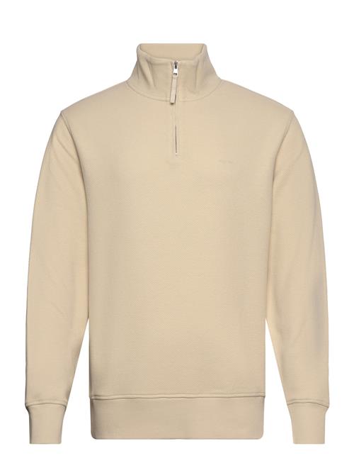 Se GANT Waffle Texture Half Zip GANT Beige ved Booztlet