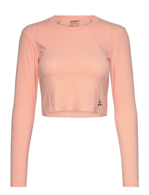 Se Craft Adv Hit Cropped Top W Craft Coral ved Booztlet