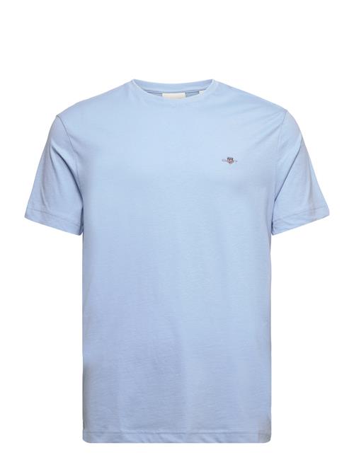 Se GANT Reg Shield Ss T-Shirt GANT Blue ved Booztlet