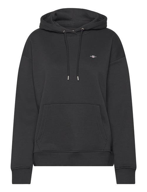 Se GANT Rel Shield Hoodie GANT Black ved Booztlet