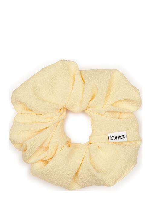 Se SUI AVA Leo Scrunchie SUI AVA Yellow ved Booztlet