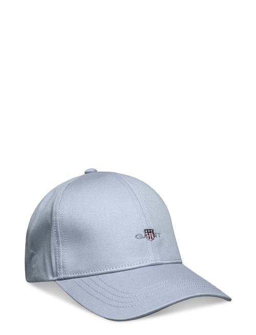 Se GANT Unisex. High Cotton Twill Cap GANT Blue ved Booztlet