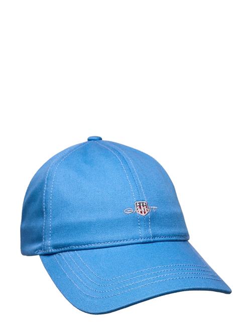 Se GANT Unisex. Shield Cap GANT Blue ved Booztlet