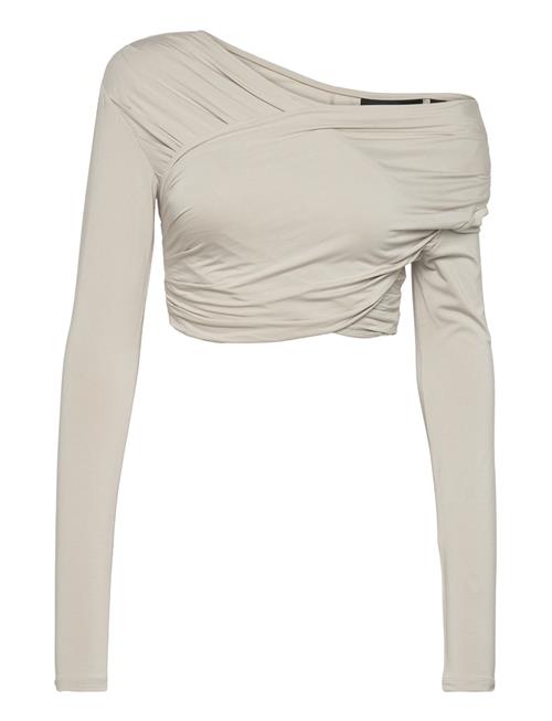 Se HAN Kjøbenhavn Viscose Jersey Stretch Cropped Long Sleeve Top HAN Kjøbenhavn Beige ved Booztlet