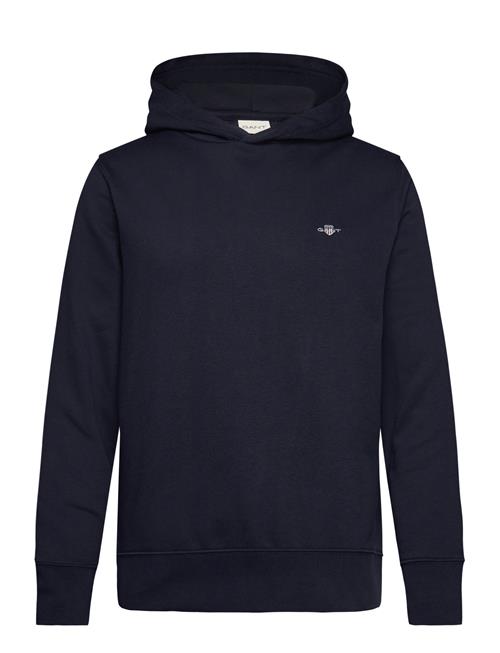 Se GANT Reg Emb Archive Shield Hoodie GANT Navy ved Booztlet