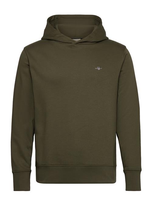 Se GANT Reg Emb Archive Shield Hoodie GANT Green ved Booztlet