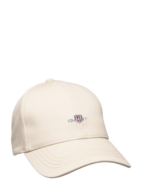 Se GANT Unisex. High Cotton Twill Cap GANT Cream ved Booztlet