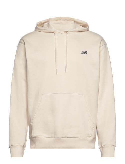 Se New Balance Sport Essentials French Terry Hoodie New Balance Beige ved Booztlet