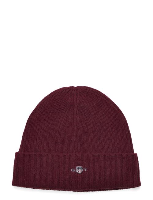 Se GANT Unisex. Shield Wool Beanie GANT Burgundy ved Booztlet