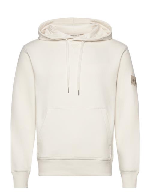 Se Calvin Klein Jeans Badge Hoodie Calvin Klein Jeans Cream ved Booztlet