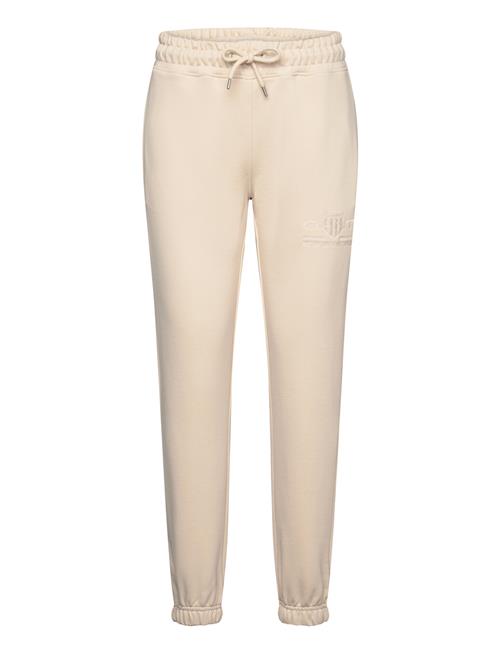 Se GANT Reg Tonal Shield Sweatpants GANT Cream ved Booztlet