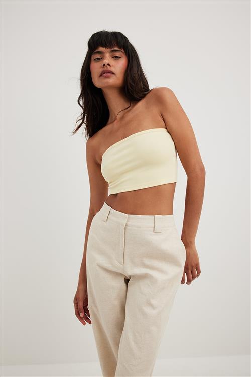 Se NA-KD Basic Cropped tubetop - Yellow ved NA-KD