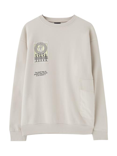 Se Pull&Bear Sweatshirt  pastelgul / sort / offwhite ved About You