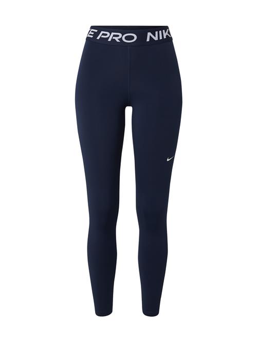 Se NIKE Sportsbukser  navy / hvid ved About You