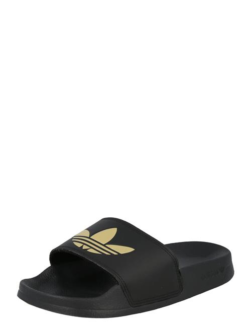 Se ADIDAS ORIGINALS Slipper 'Adilette Lite'  guld / sort ved About You