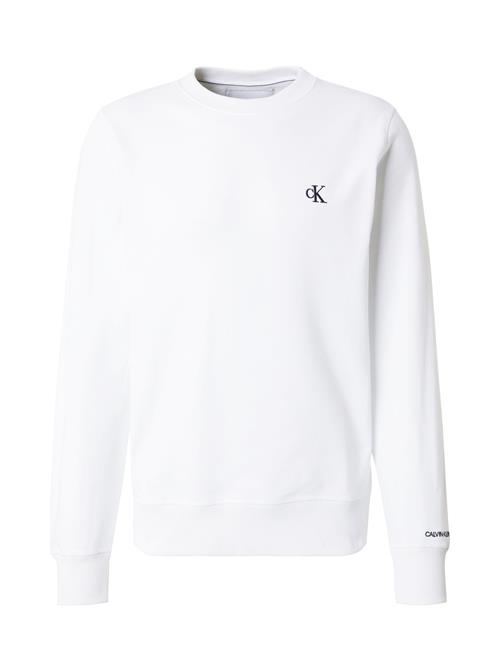 Se Calvin Klein Jeans Sweatshirt 'Essential'  sort / hvid ved About You