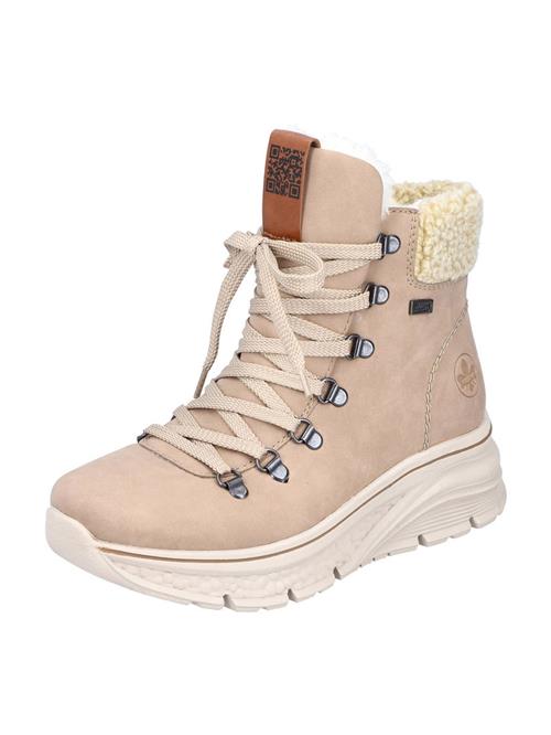 Se Rieker Snowboots  creme / chamois ved About You