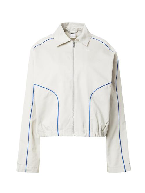 Se Nike Sportswear Overgangsjakke  blå / lysegrå / hvid ved About You