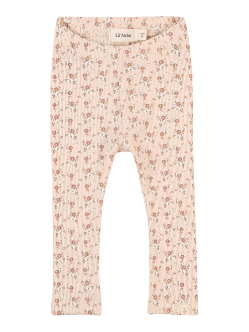 Se Lil'Atelier Leggings 'NBFGAGO'  pastelgrøn / mørkeorange / pudder / hvid ved About You