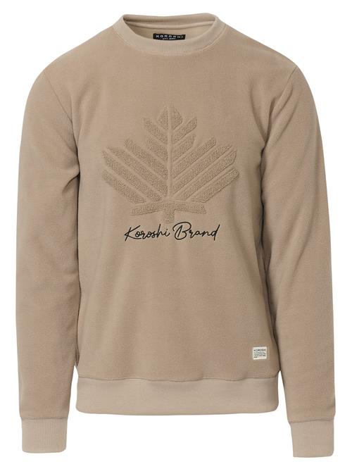 Se KOROSHI Sweatshirt  chamois / sort ved About You