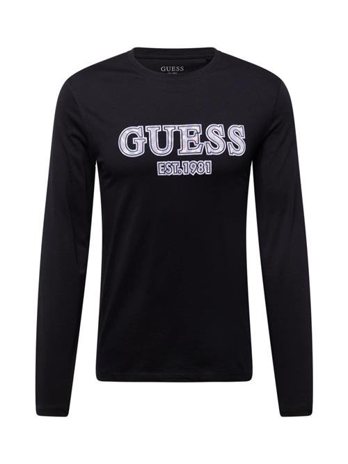 Se GUESS Bluser & t-shirts  lyseblå / fersken / sort / hvid ved About You