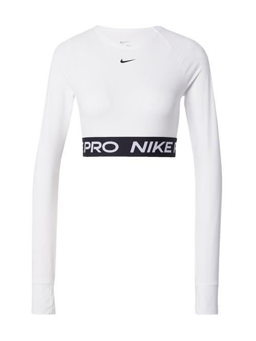 Se NIKE Funktionsbluse 'PRO'  sort / hvid ved About You