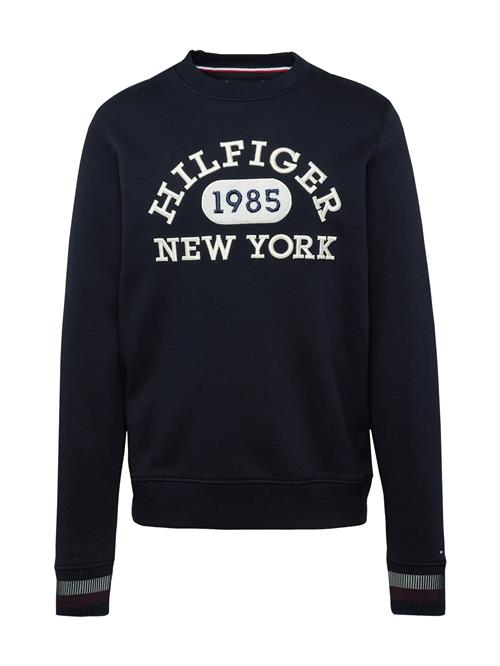 Se TOMMY HILFIGER Sweatshirt  navy / rød / hvid ved About You