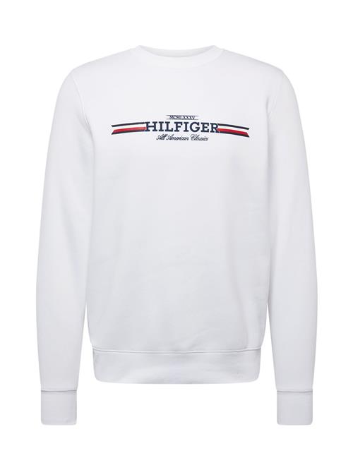 Se TOMMY HILFIGER Sweatshirt  mørkeblå / rød / sort / hvid ved About You