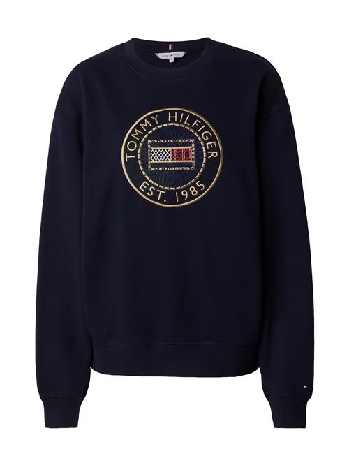 Se TOMMY HILFIGER Sweatshirt  navy / gylden gul / rød / hvid ved About You