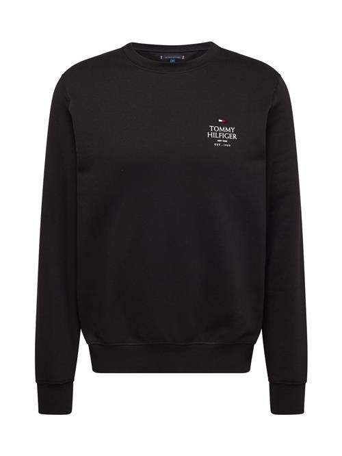 Se TOMMY HILFIGER Sweatshirt  sort / hvid ved About You