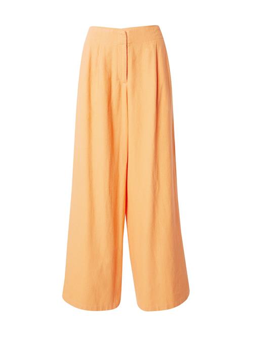 Se TOPSHOP Bukser med lægfolder  orange ved About You