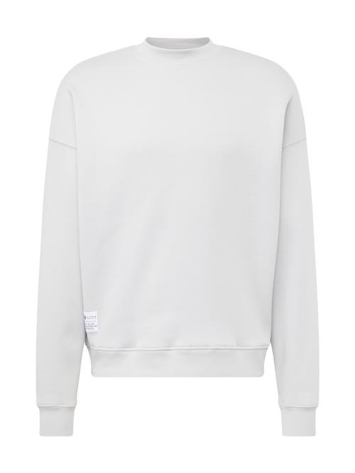 Se ALPHA INDUSTRIES Sweatshirt  lysegrå / brombær / sort / hvid ved About You