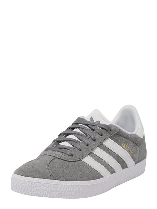 Se ADIDAS ORIGINALS Sneakers 'Gazelle'  guld / grå / hvid ved About You